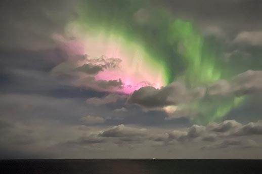 A view of The Northern Lights at sea, from the Spirit of Adventure.